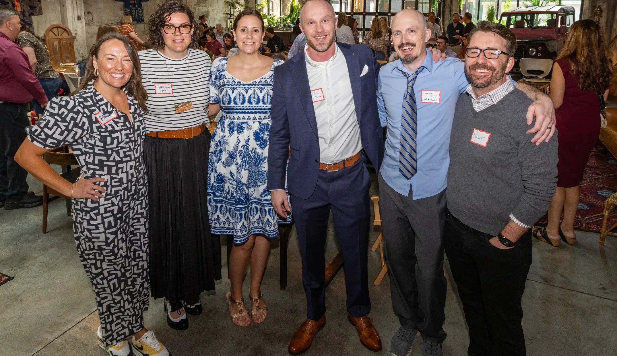 The Envision Promotions team together at a partner event